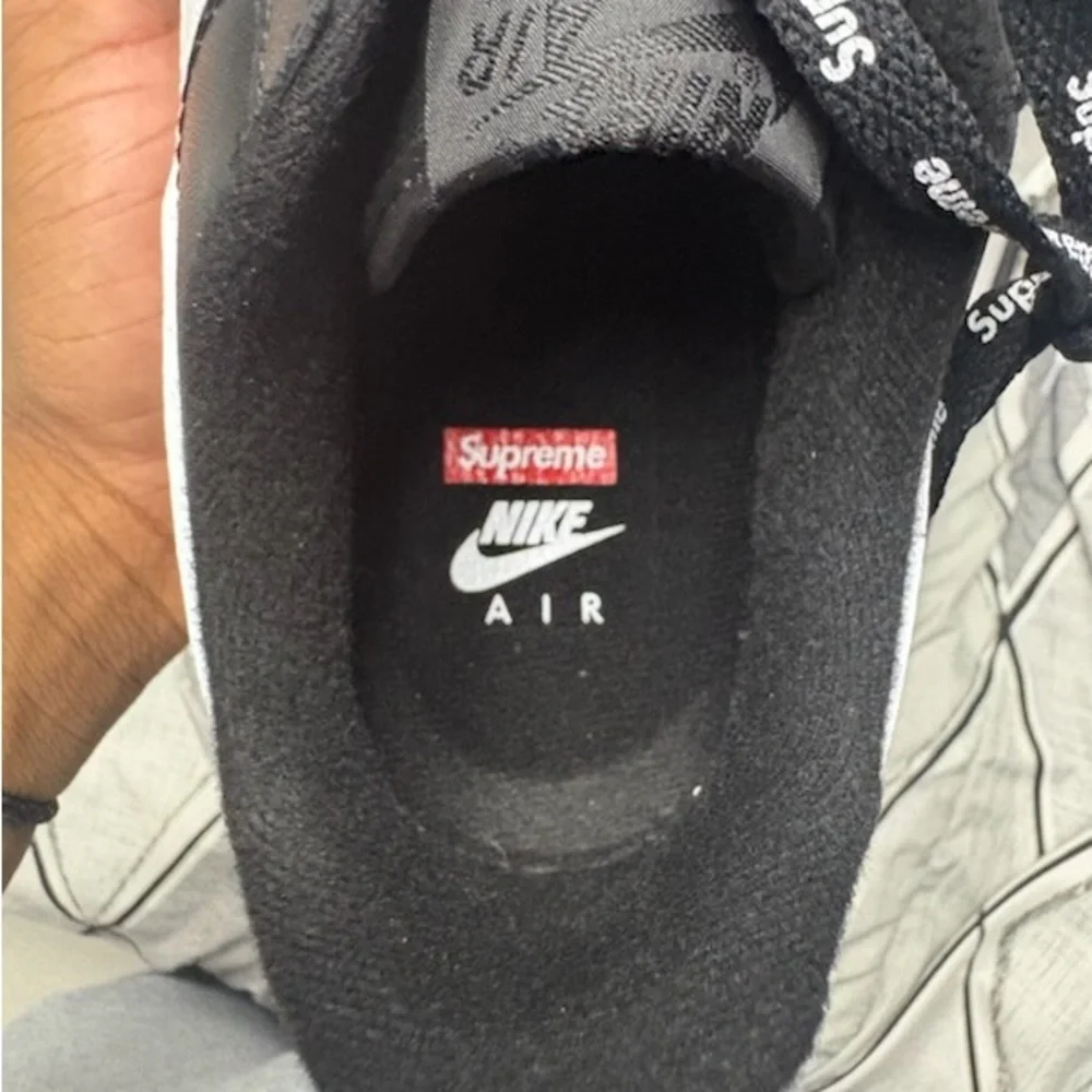 Supreme Black Sneakers with White Swoosh